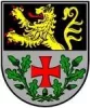 Das Ransweiler Wappen zeigt einen goldenen Löwen in der oberen Hälfte und ein rotes Kreuz mit Eichenlaub in der unteren Hälfte