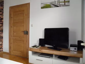 TV Bord im Wohnzimmer (© Ferienwohnung H. Diehl)