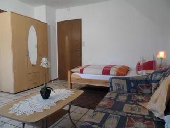 Einzelschlafzimmer Bett