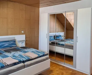 Elternschlafzimmer (© Archiv: Appartement Persang)