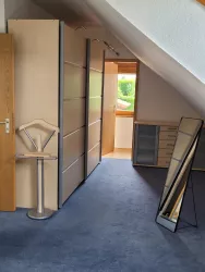 1. Schlafzimmer mit Kleiderschrank und Sideboard