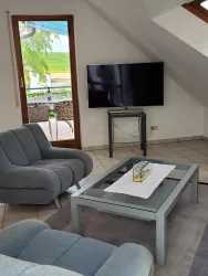 Wohnzimmer mit Flachbildschirm