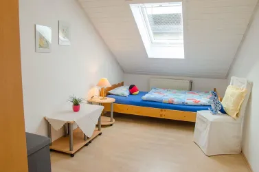 Schlafzimmer 2 mit Einzelbett - Fewo im OG