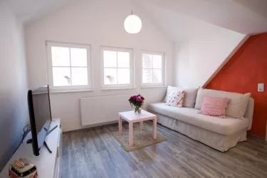 3. Stock: Wohnbereich mit Schlafsofa
