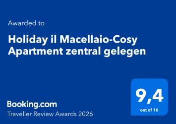 Ein Preisbanner für das "Holiday il Macellaio-Cosy Apartment". Es hat eine Bewertung von 9,4 von 10 und ist zentral gelegen.