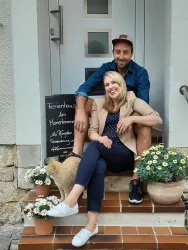 Wir die Gastgeber
