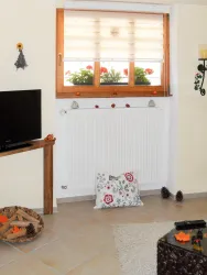 Wohnzimmer mit Flat TV