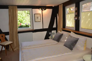 Schlafzimmer mit Fachwerk