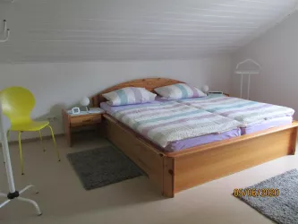 Schlafzimmer 1 mit Doppelbett