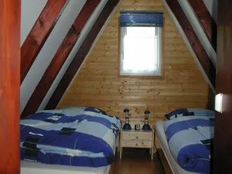 128 2-Bettschlafzimmer (© Gebhardt)