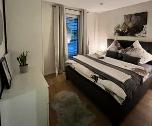 Schlafzimmer (© Archiv Ferienwohnung Timeout am Bärensteig)