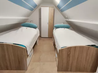 Schlafzimmer im Spitzboden