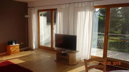 Wohnzimmer mit Blick zur Terrasse