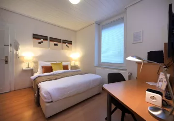 Classic Apartment “70” - Schlafzimmer
