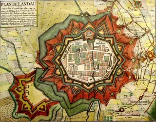 Eine historische Karte von Landau mit einem sternförmigen Festungsdesign. Die Stadt ist von starken Mauern und Gräben umgeben, umgeben von einer Landschaft.