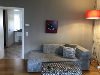 Wohnzimmer mit Blick in Küche, Stadtoase