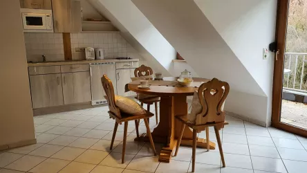 Wohnung Wegelnburg, Essbereich/Küche (© Christine Rodach)