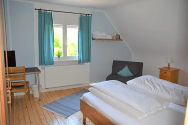 Schlafzimmer rechts OG (2) (© Archiv: Ferienhaus Brug)