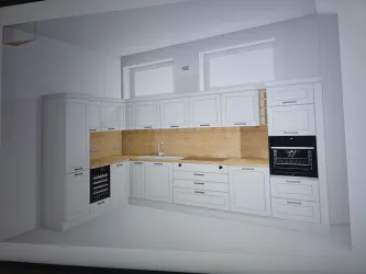 Eine moderne Küche in Weiß mit Holz-Elementen. Sie verfügt über verschiedene Schränke und integrierte Geräte.