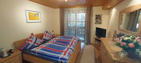 Schlafzimmer mit Balkon
