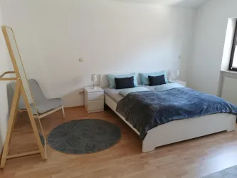 Schlafzimmer (© Archiv Ferienwohnung Burgpanorama)