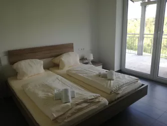 Schlafzimmer (© Archiv Wachtfels-Lodge)