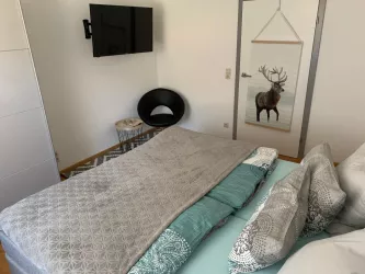 Schlafzimmer 2 (© Archiv Haus Zwölf)
