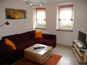 Wohnzimmer Bild 2 (© Haus Vinea)