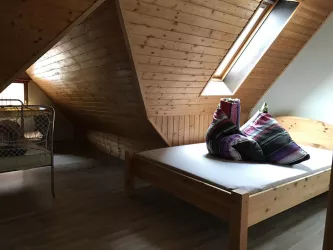 Zweites Schlafzimmer im ersten Obergeschoss