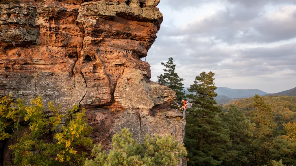 Kletterer an den Geiersteinen im Sonnenuntergang
