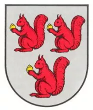 drei rote Eichhörnchen auf grauem Grund