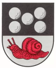 Oben fünf graue Kugeln auf schwarzem Grund unten rote Schnecke auf grauem Grund