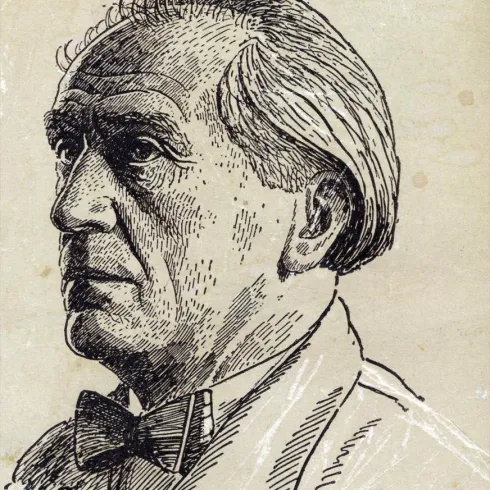 Ein Porträt eines Mannes mit grauen, zurückgekämmten Haaren und einem Schnurrbart. Er trägt eine Anzugjacke und eine Fliege.