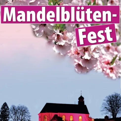 Ein festlicher Hintergrund mit Mandelblüten und einer beleuchteten Kirche. Darüber steht "Mandelblüten-Fest".