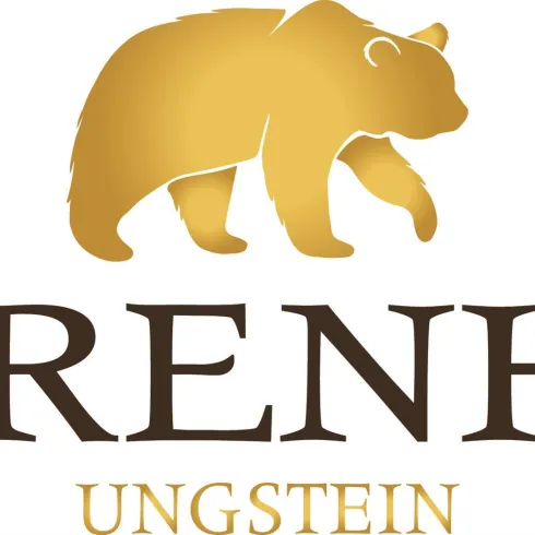 Ein Logo mit dem Schriftzug "Bärenhof Ungstein" und einer stilisierten goldenen Bärenillustration. Es vermittelt ein Gefühl von Natur und Qualität.