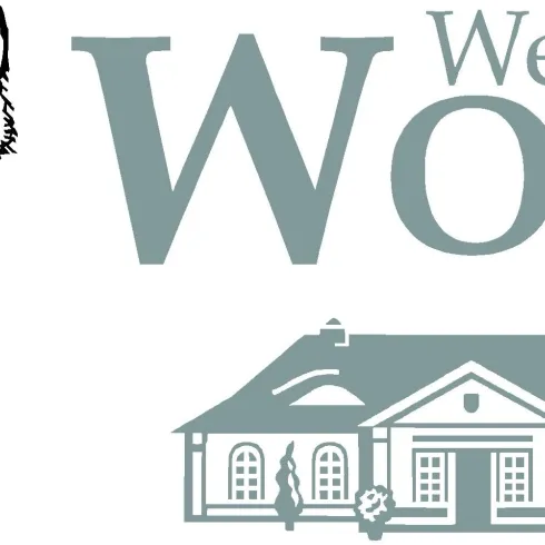 Ein Wolf steht neben dem Schriftzug "Weingut WOLF". Im Hintergrund ist ein stilisiertes Gebäude abgebildet.