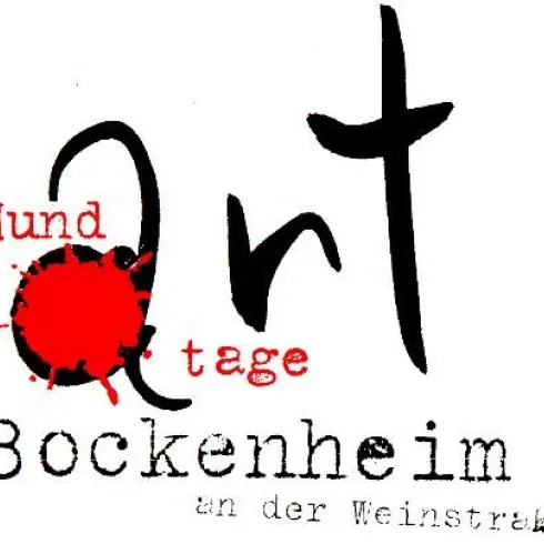 Ein künstlerisches Logo für die „Mundarttage“ in Bockenheim. Es zeigt eine kreative Schrift mit einem roten Farbspritzer.