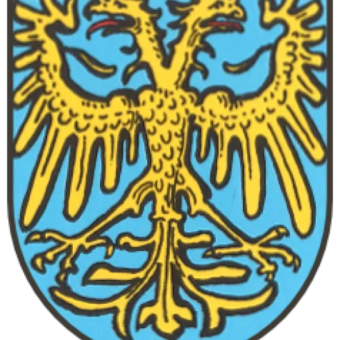 Ein Wappen mit einem blauen Hintergrund. Es zeigt zwei goldene Lilien und eine silberne Kreuzung auf einem gelben Schild.
