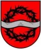 Wappen von Dörnbach mit schwarzer Dornenkrone auf rotem Grund