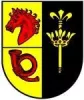 Das Reichsthaler Wappen mit rotem Pferdekopf und Posthorn auf gelbem Grund links und gelber Krone und Zepter auf schwarzem Grund rechts